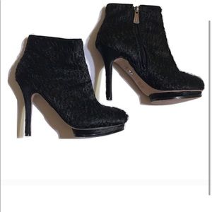 Gorgeous black booties by BCBG.